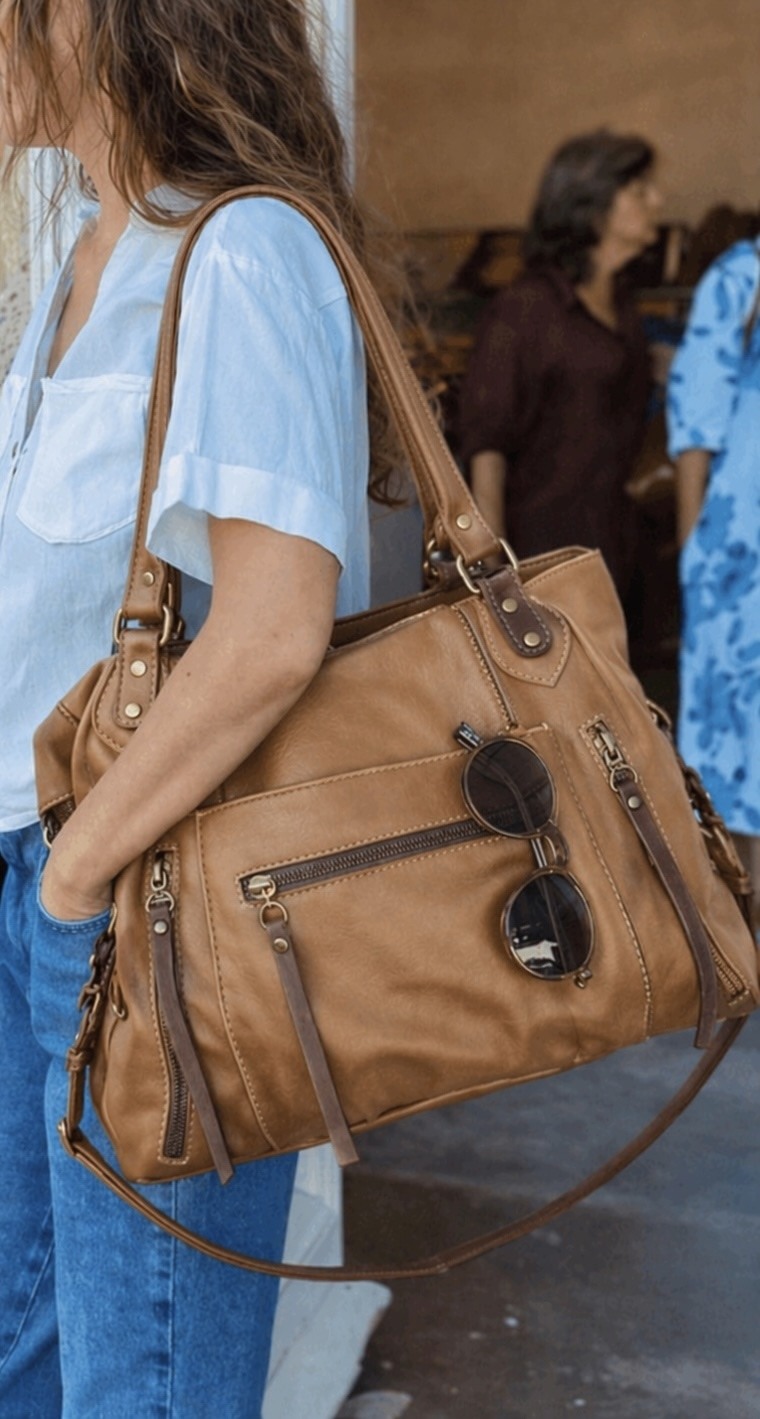 Cartera Revolution leather bag