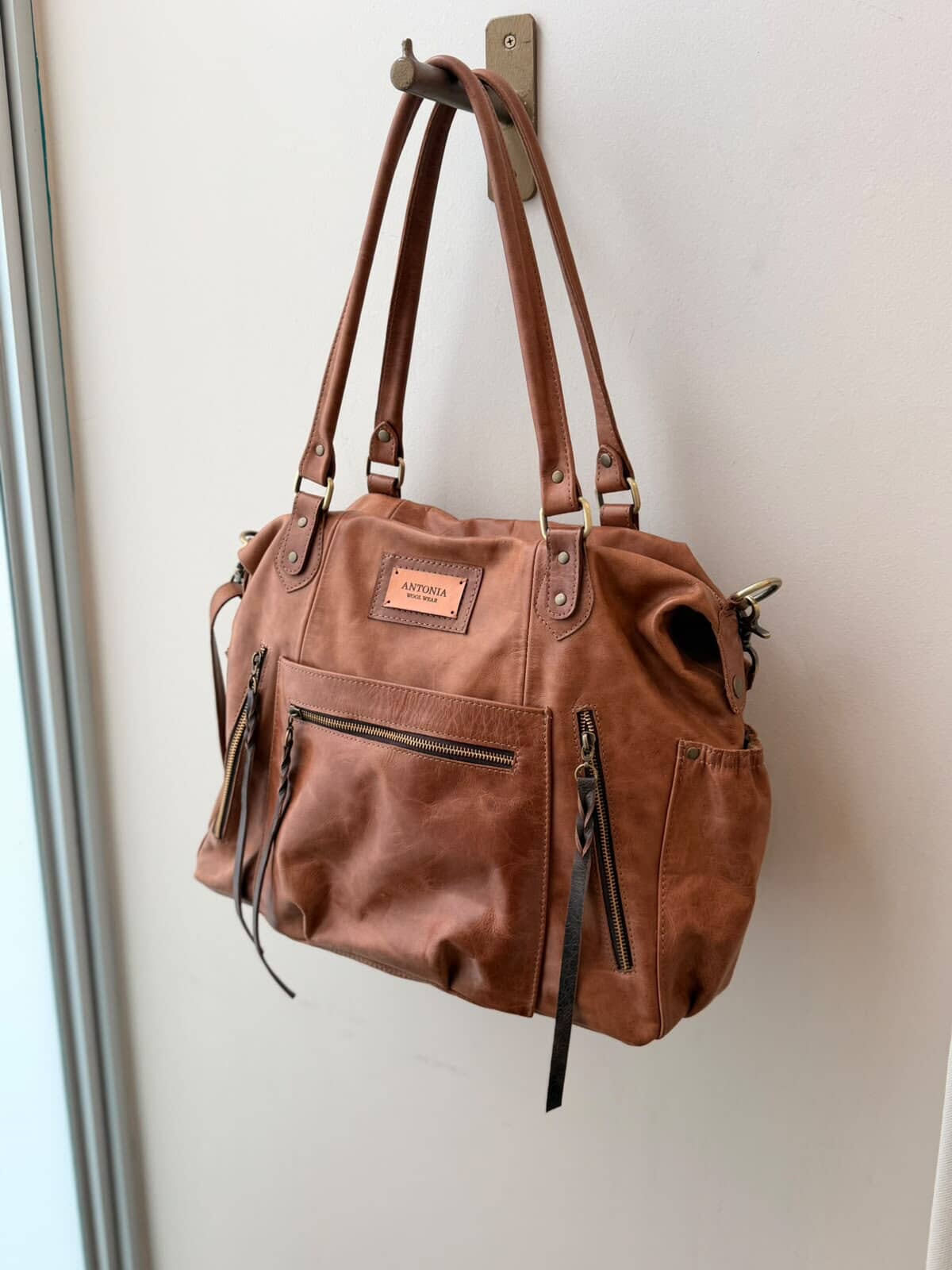 Bolso maternal  de cuero