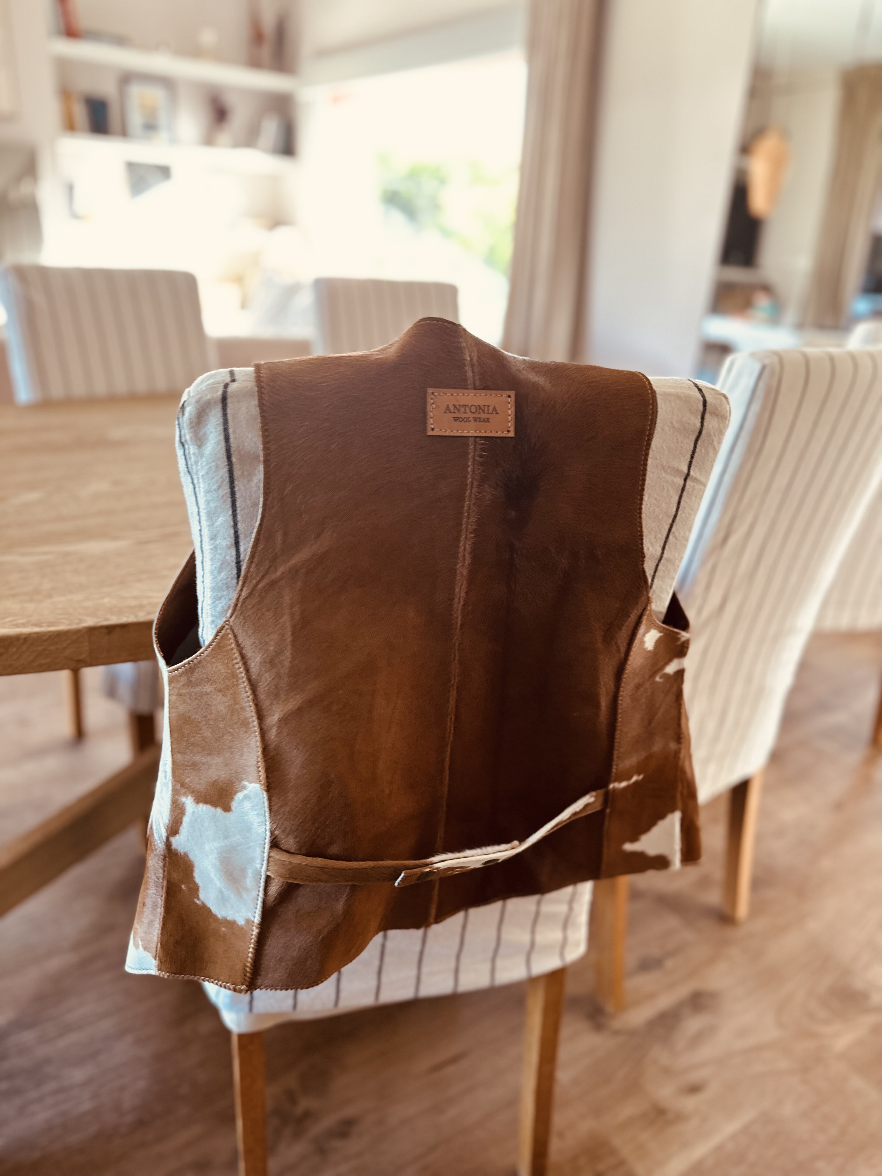Cow print leather vest