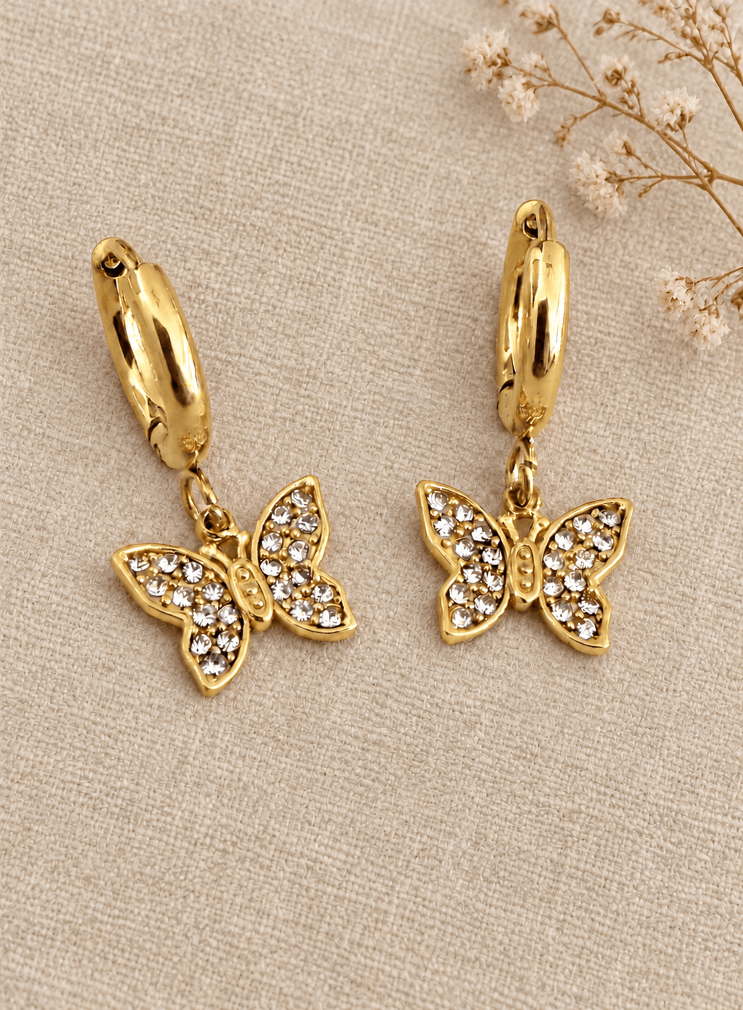 Caravana BUTTERFLY en acero dorado