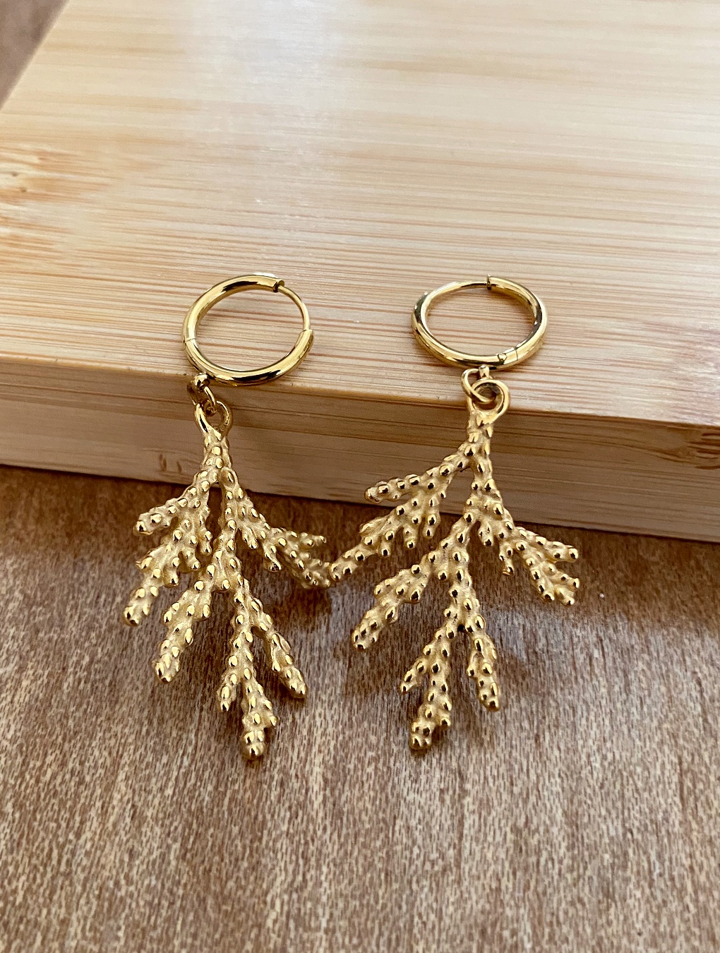 Caravana ROOT en acero dorado