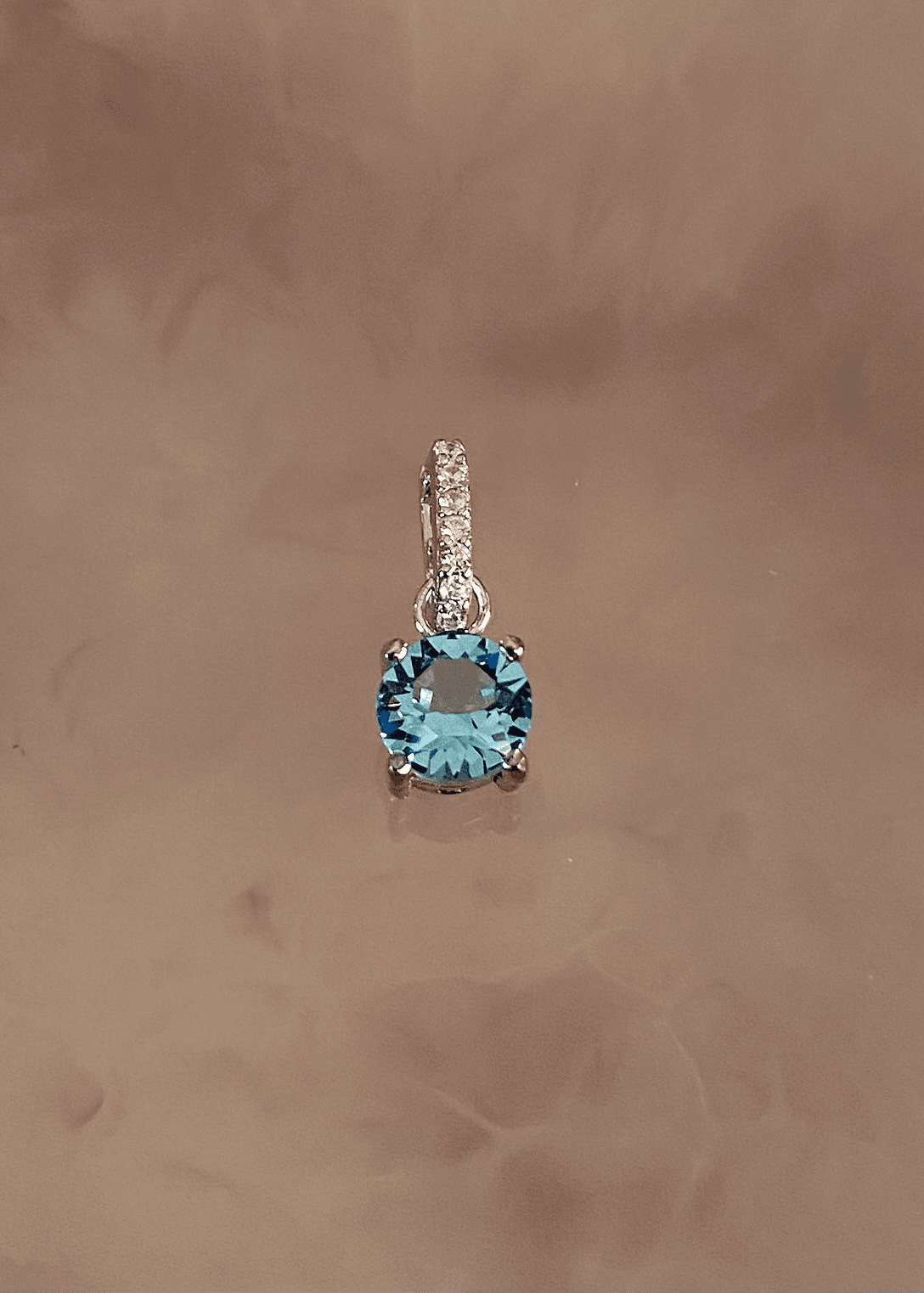 Dije en Plata 925 con cristal Swarovski color aguamarina y zirconia