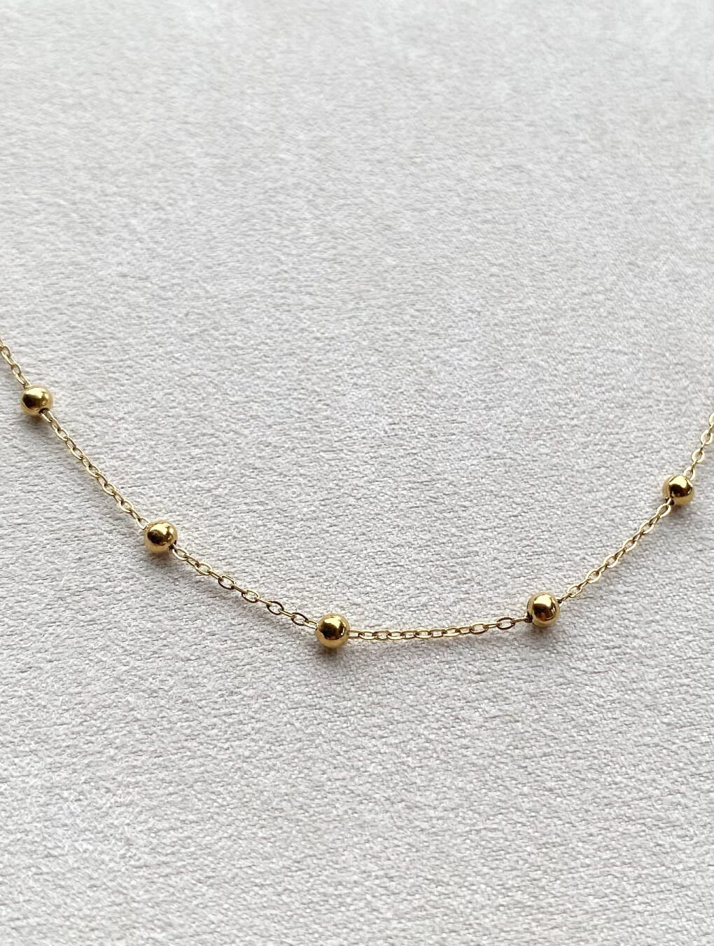 Collar RITA en acero dorado