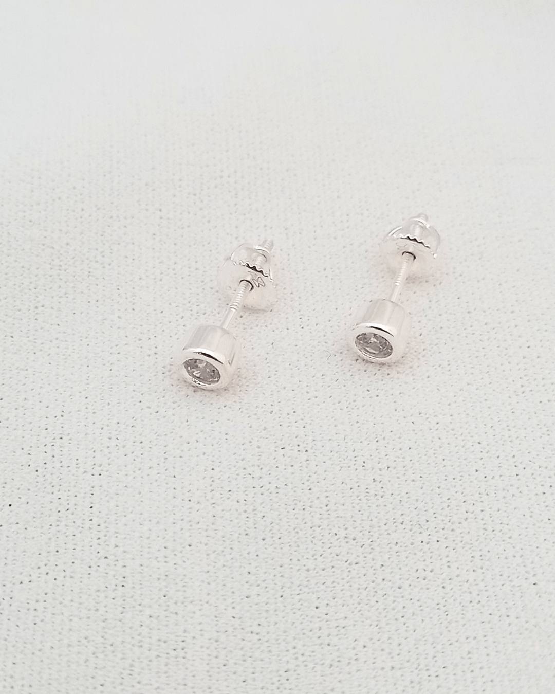 Caravanas Punto de luz plata