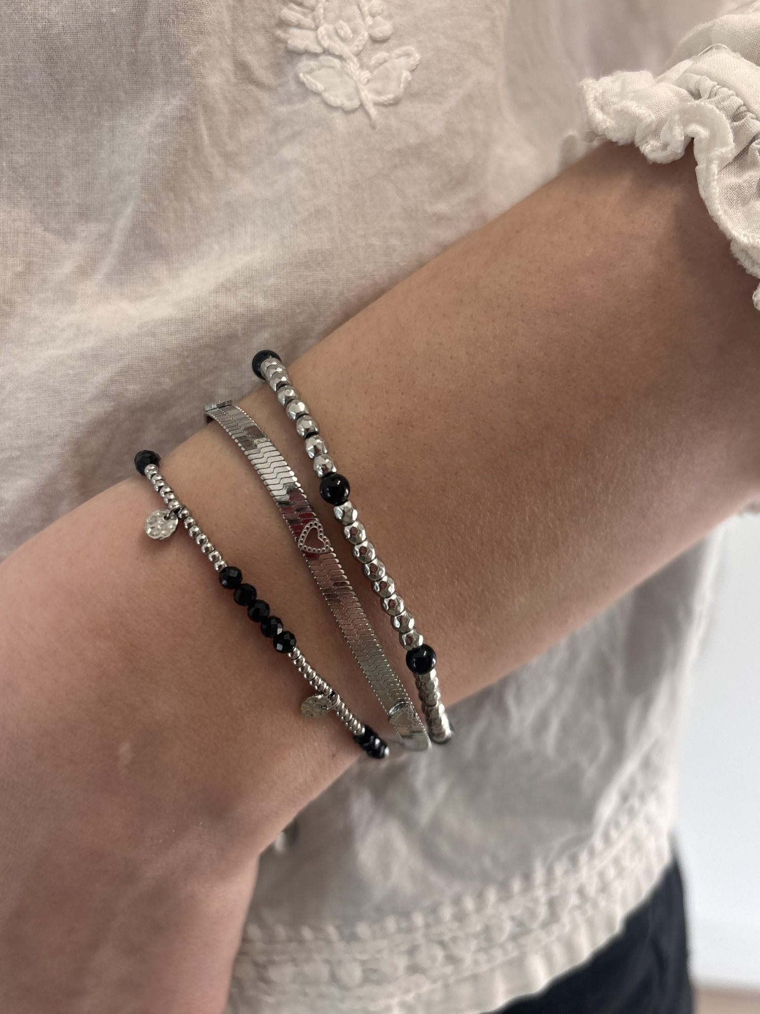 Pulsera Chapitas plateada