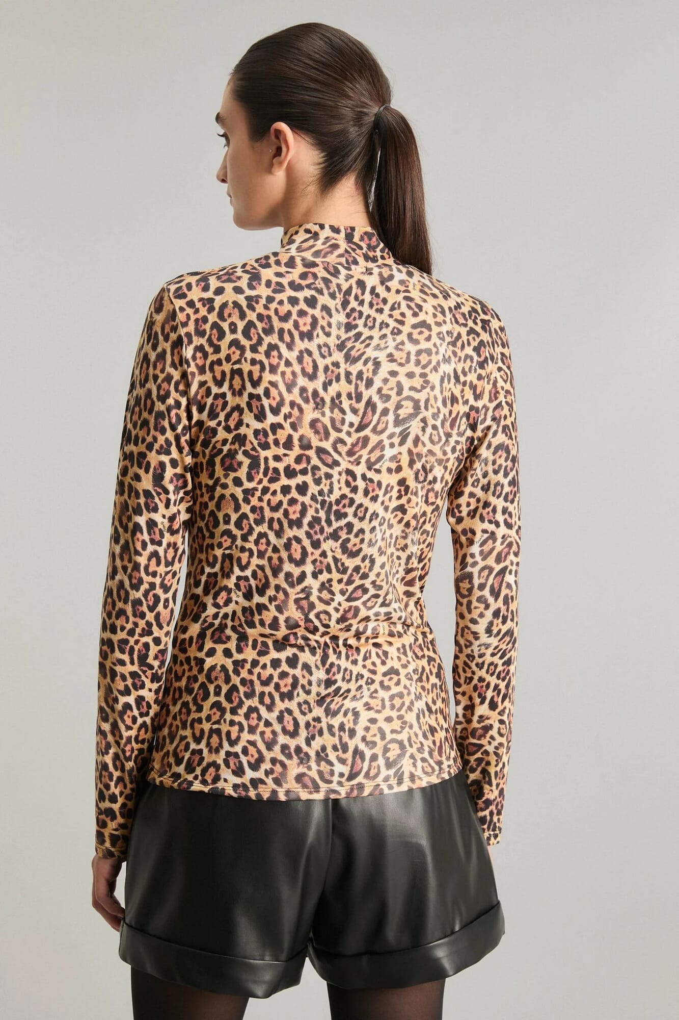POLERA GLOW LEOPARD