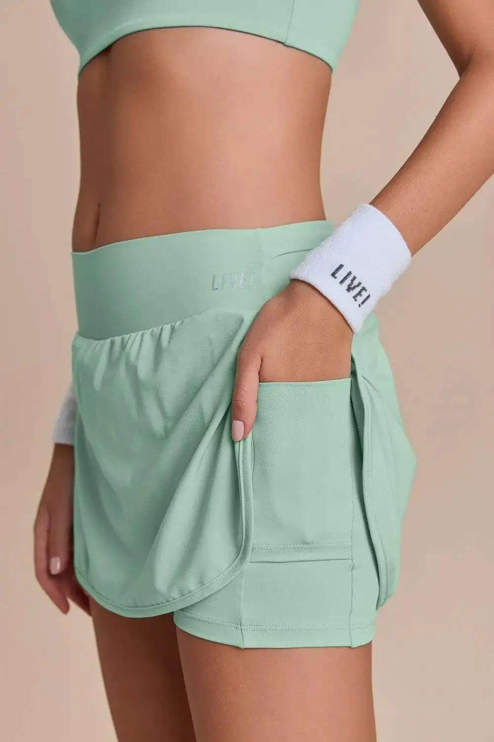 CONJUNTO POLLERA DRYSIDE Y TOP MOVE SENSE