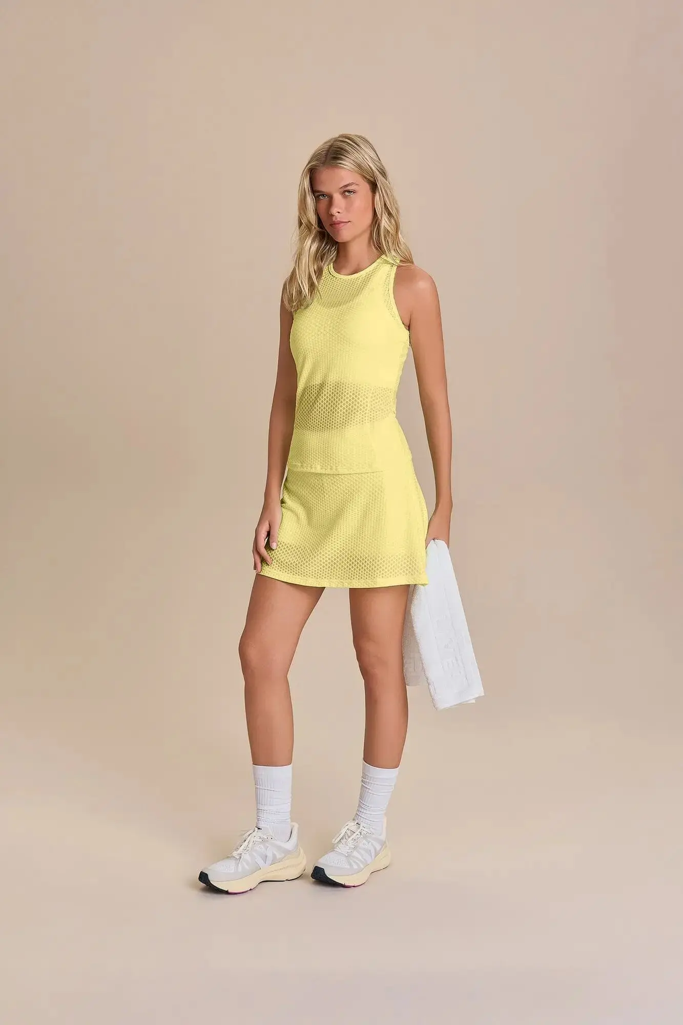 CONJUNTO MUSCULOSA Y POLLERA RUN TEXTURE